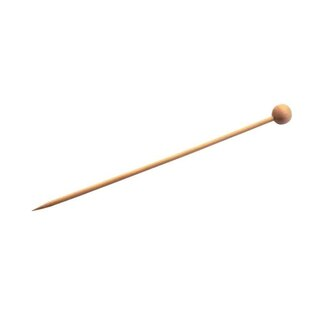 A long bamboo skewer with a naturally colored ball on the end