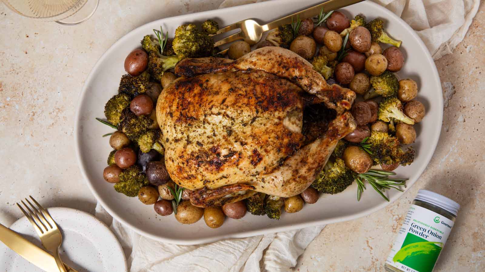 Gourmend recipe for low fodmap whole roasted chicken with lemon & rosemary potatoes