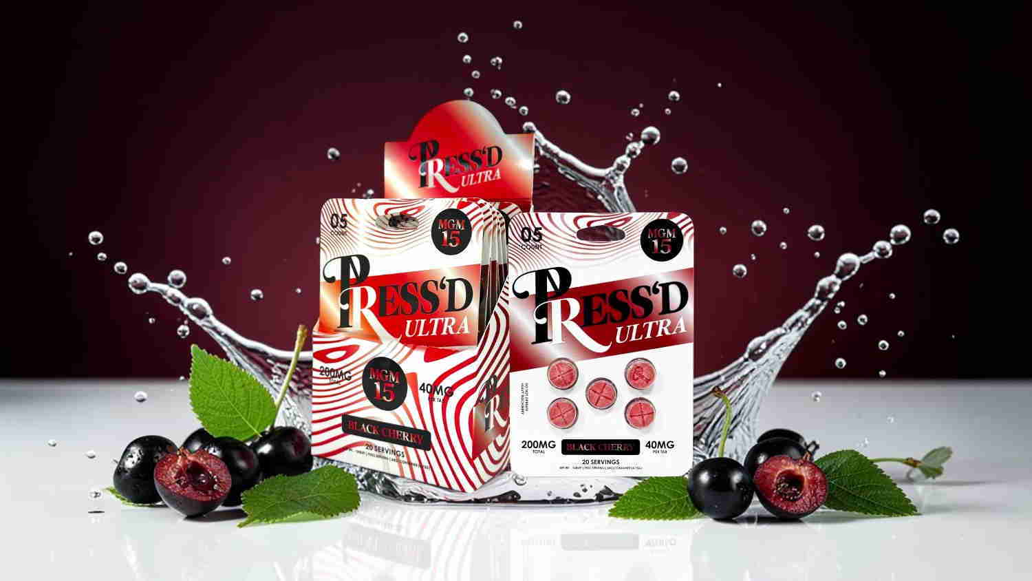 Two product boxes with splashing water and fruit on a white surface.