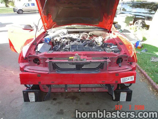 Detail of Shocker XL train horn plumbing on 2003 Ford Mustang HornBlasters gallery photo 5