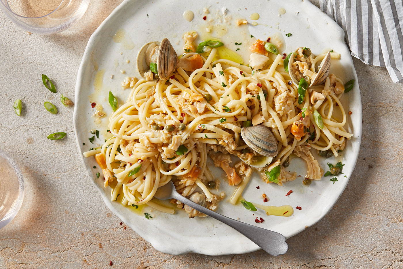 Linguine with clams in shells served on a plate