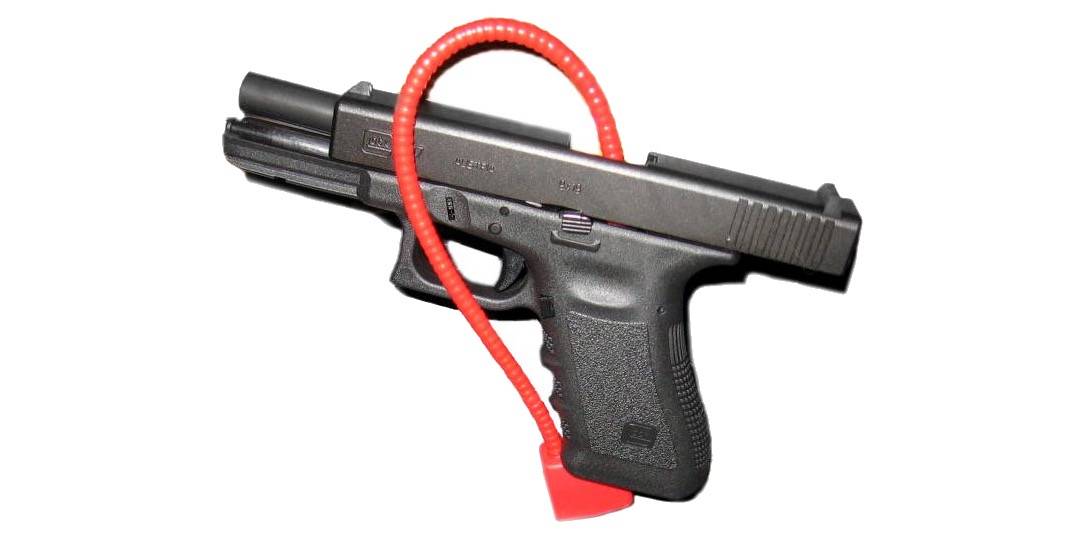 A Glock 19 disarmed and secured for transport (or storage) with a cable lock through its receiver