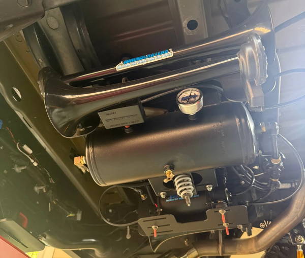 Stealth Spare Tire Delete Kit mounted in the Gladiator spare tire well