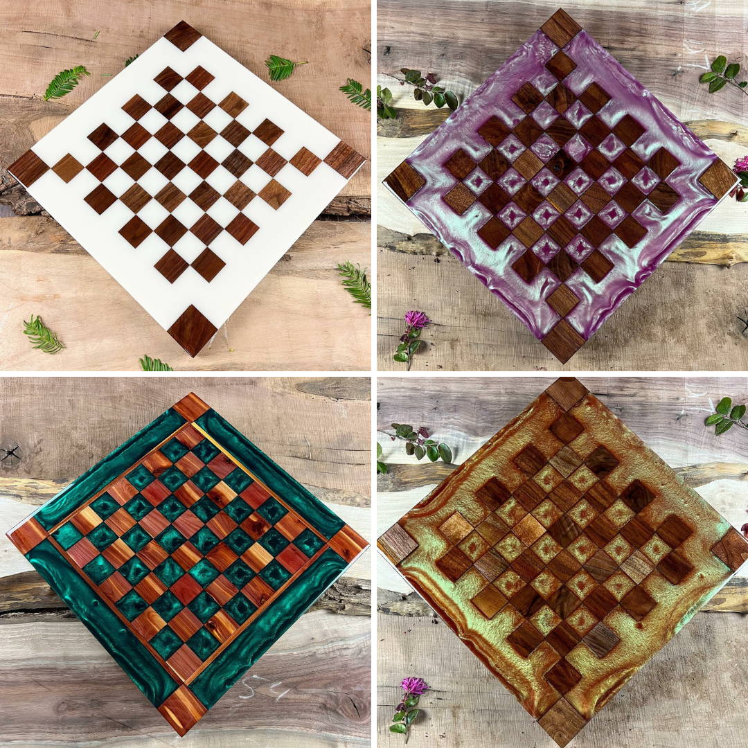 four custom wood chess boards from southern river tables laying on top of a wooden table