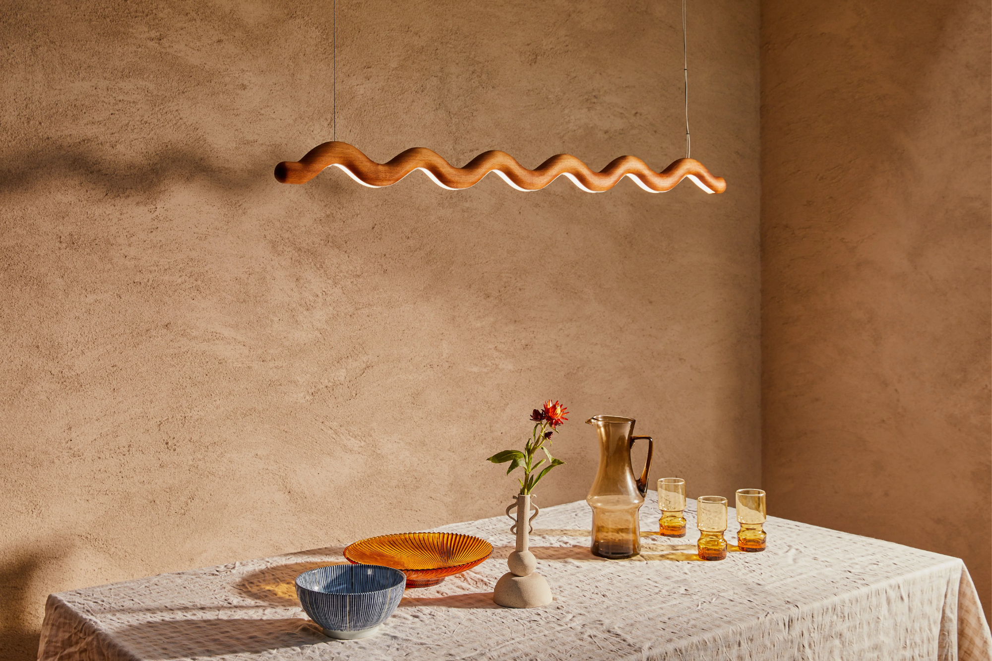 Handmade Timber Linear Pendant | Wave above a rustic kitchen table