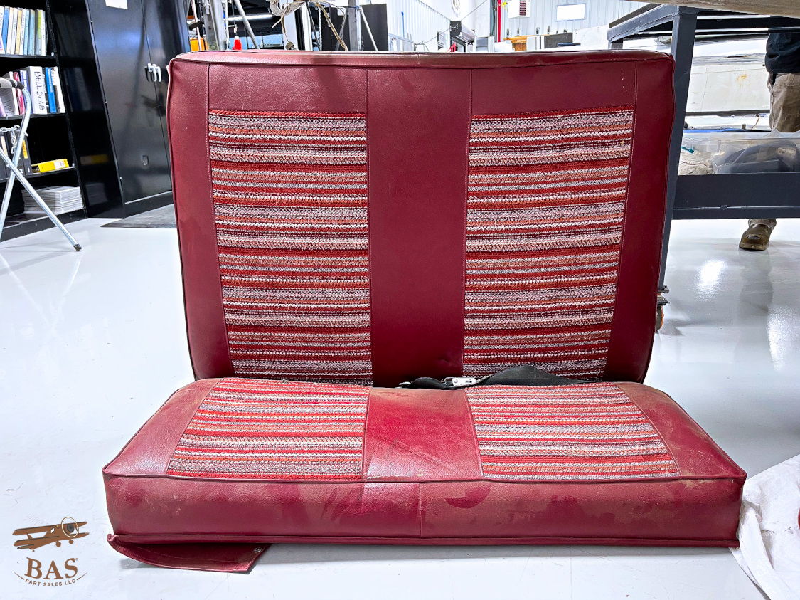 Red and striped upholstered furniture with a seat and backrest.