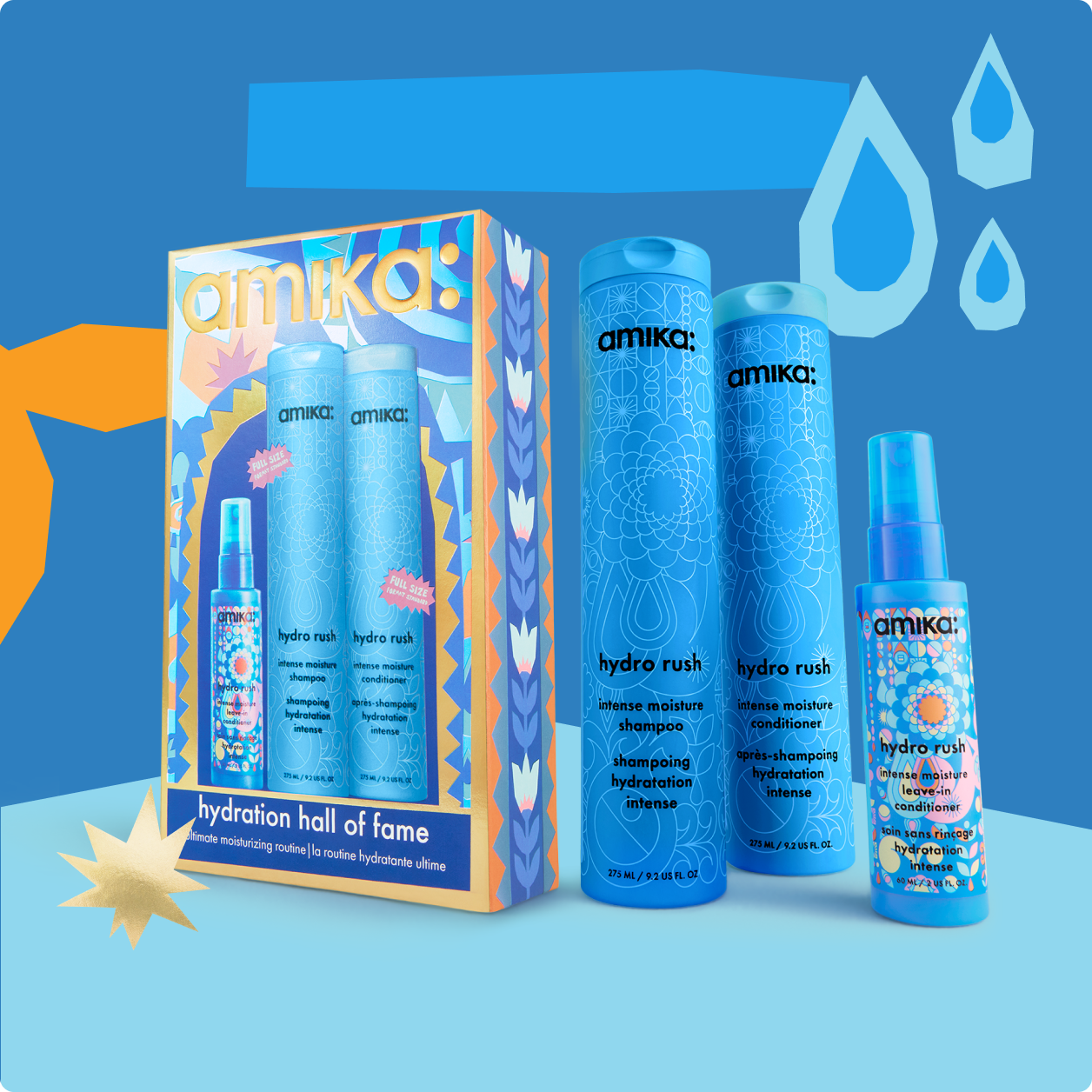 Amika hair care product set with blue bottles and packaging.