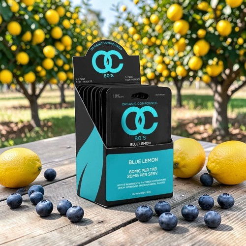 Product display with blueberry flavor in a citrus orchard setting.