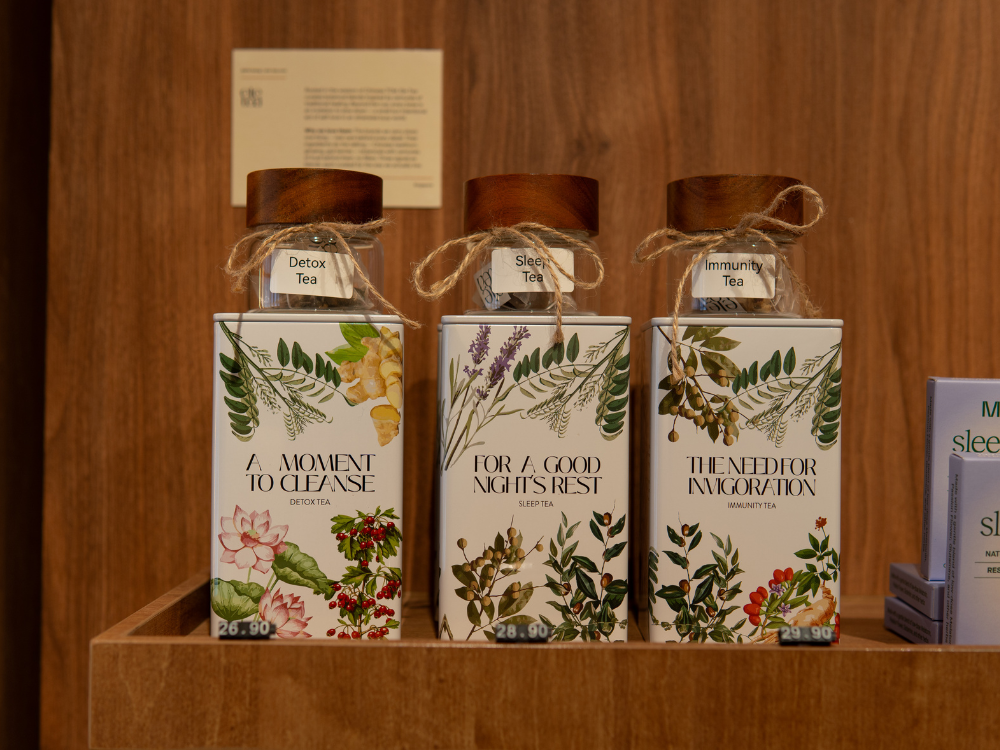 three different tea variants in a box on a shelf