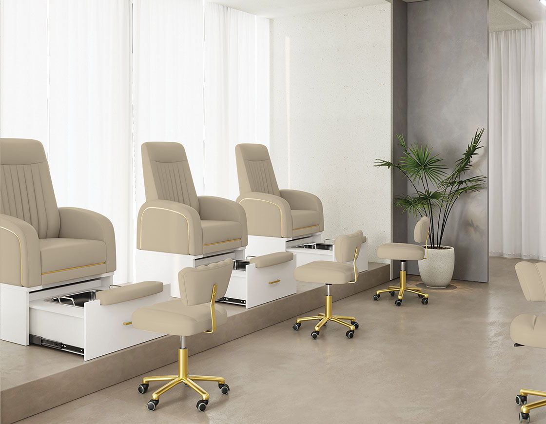 Interior of a nail salon with beige chairs and stools near large windows.