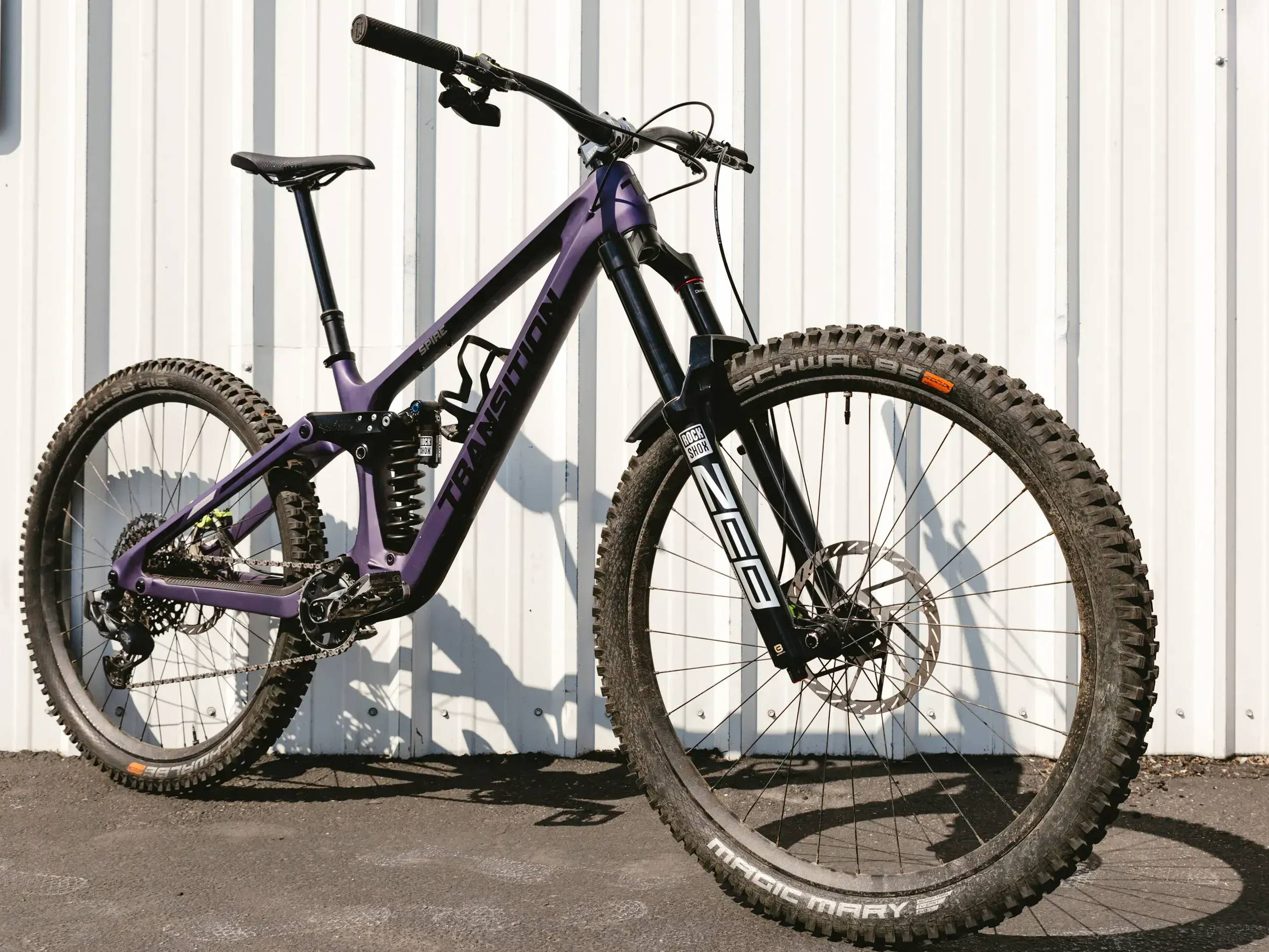 purple transition spire with a rockshox super deluxe coil ultimate rear coil shock
