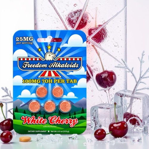 Pack of white cherry-flavored edibles with cherries and ice in the background.