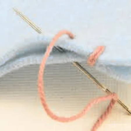 detail of a whip stitch, sewn with a hand needle
