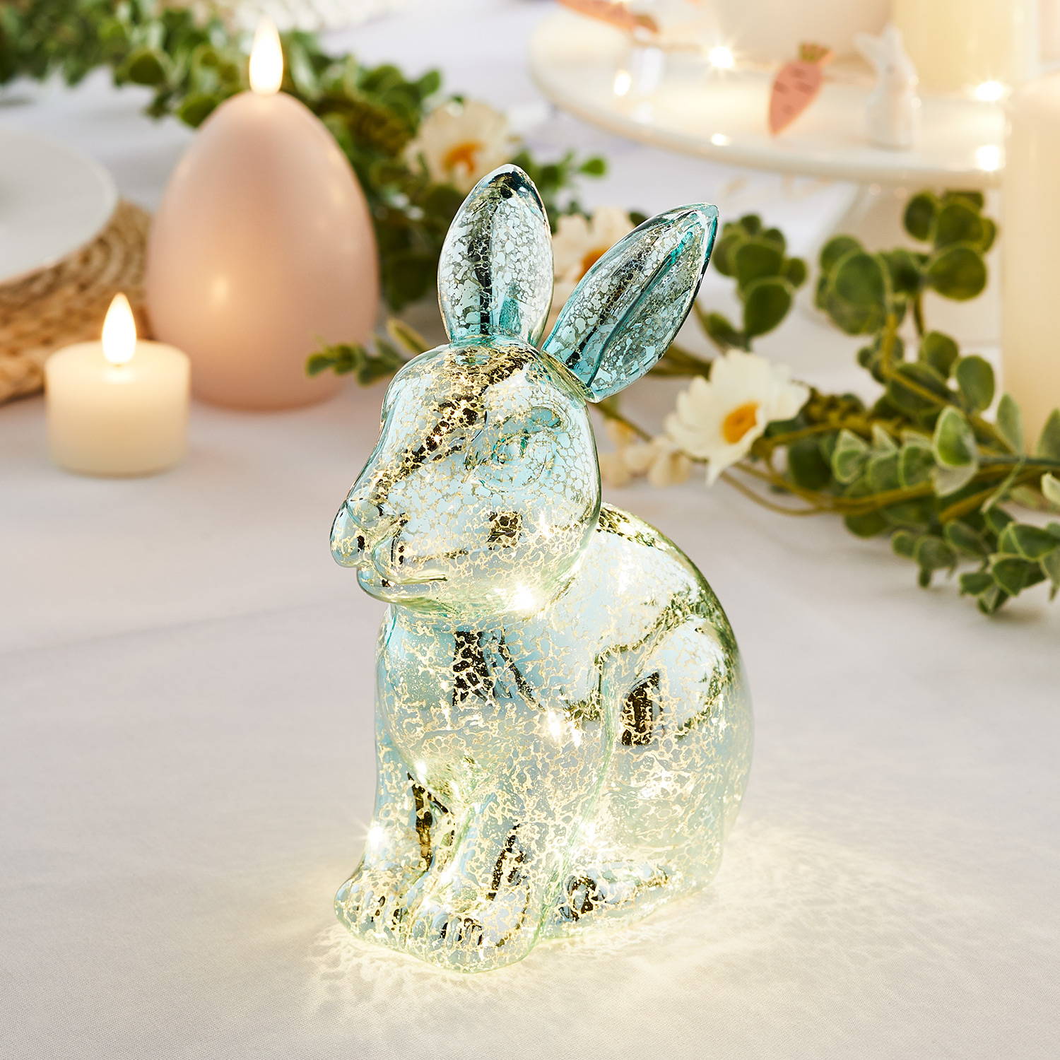 Mottled Easter bunny light illuminated on Easter table