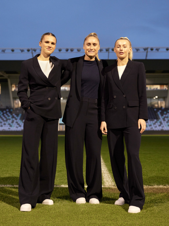 Man City players wearing Clever Crepe suiting from The Fold London