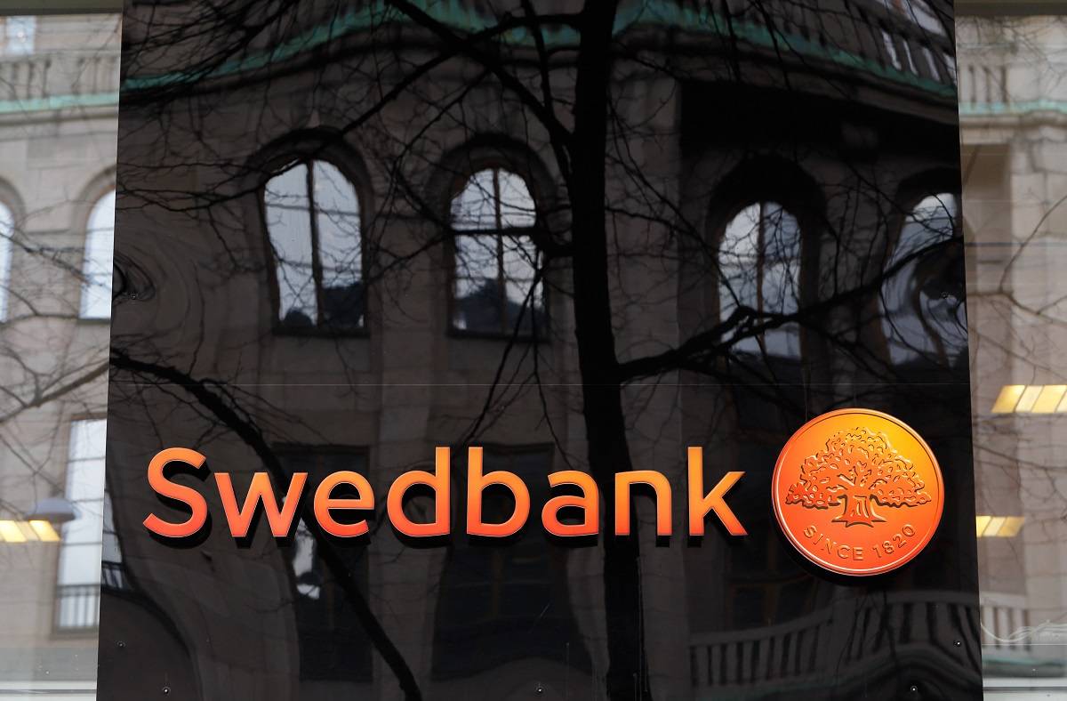 Swedbank Logo on top of a building reflection
