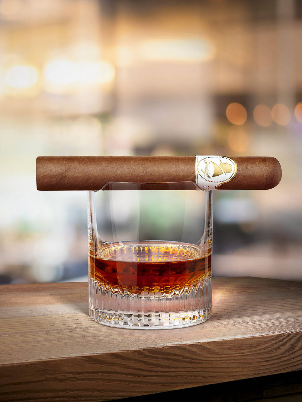 A Davidoff Winston Churchill «The Original Series» cigar on a spirit glass.