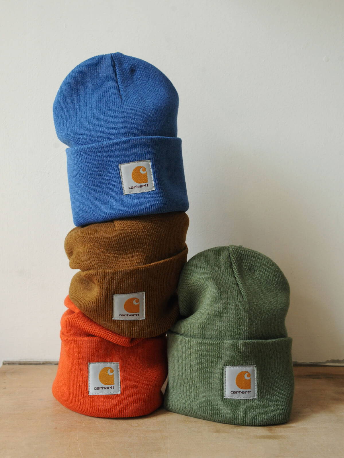 A styled image of Carhartt hats.