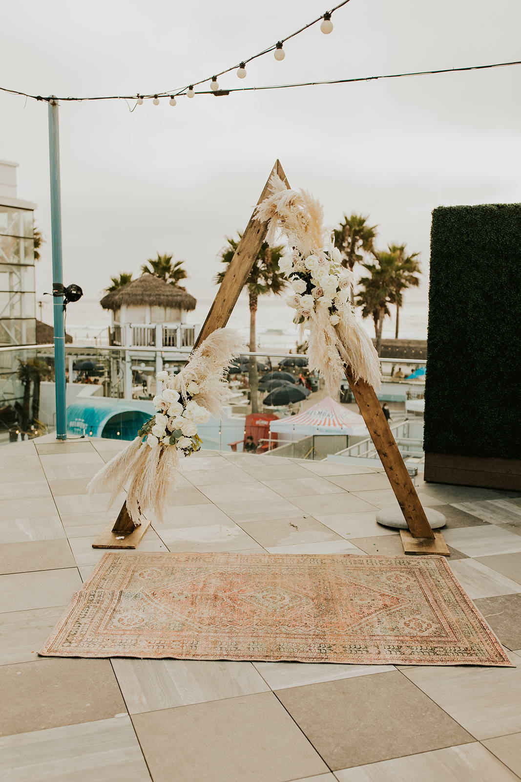 Triangle arbor with white florals decorated