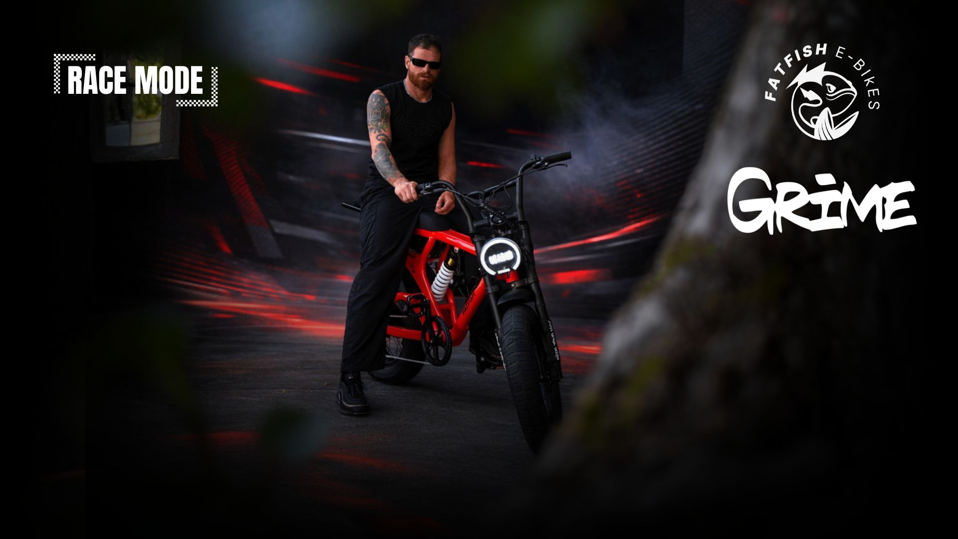 Person riding a red electric bike with a dark background and graphic text.