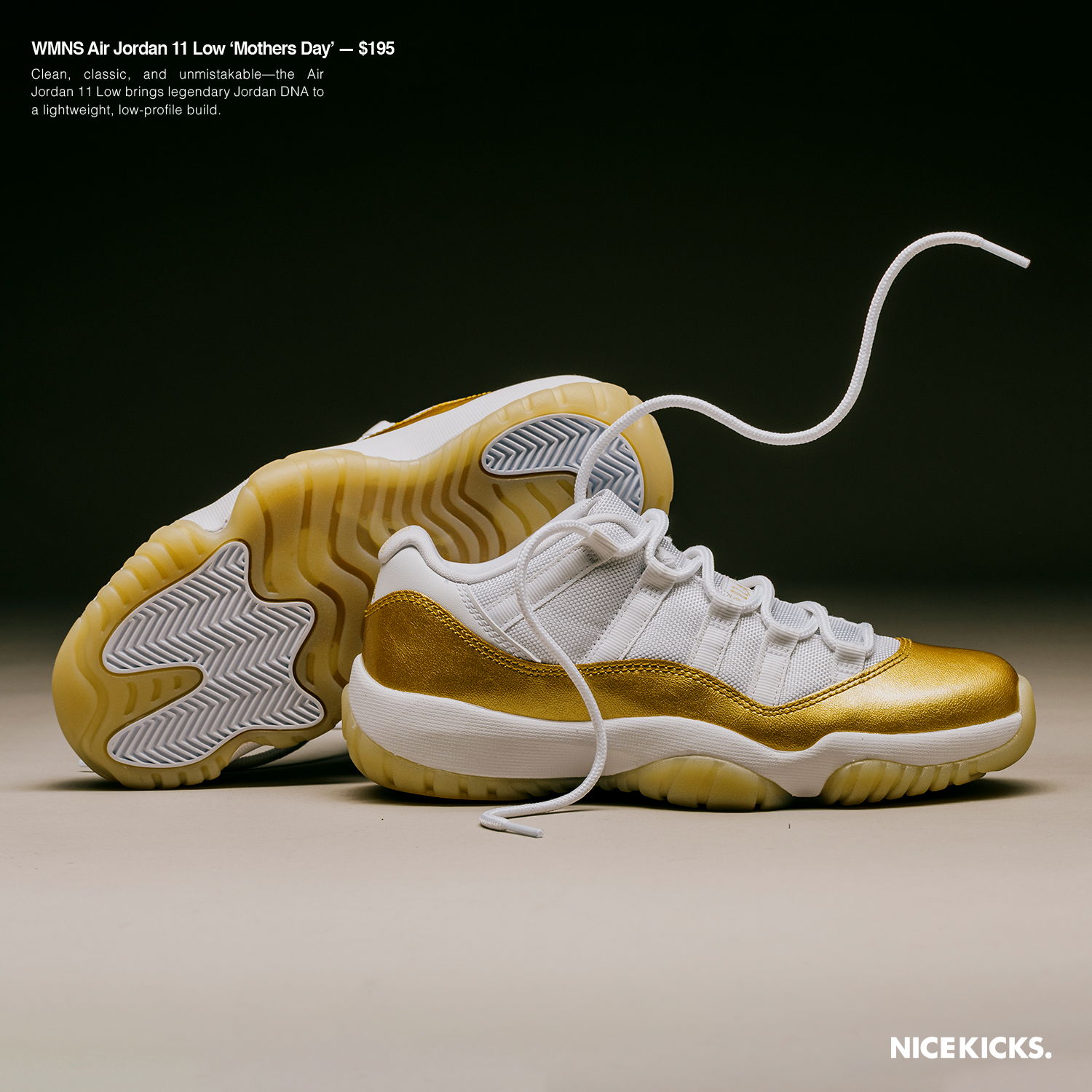 White and gold sneakers on a simple background.
