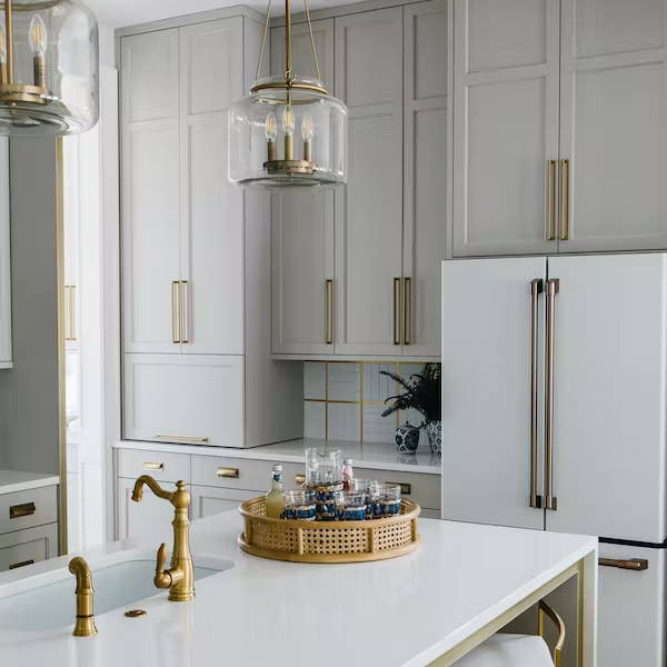 Kitchen designed by Gretchen black with white matte refrigerator