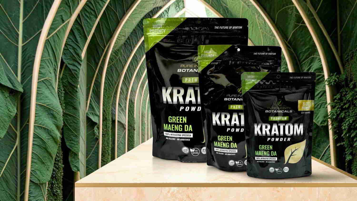 Three bags of Kraium products on a wooden table with green foliage background.
