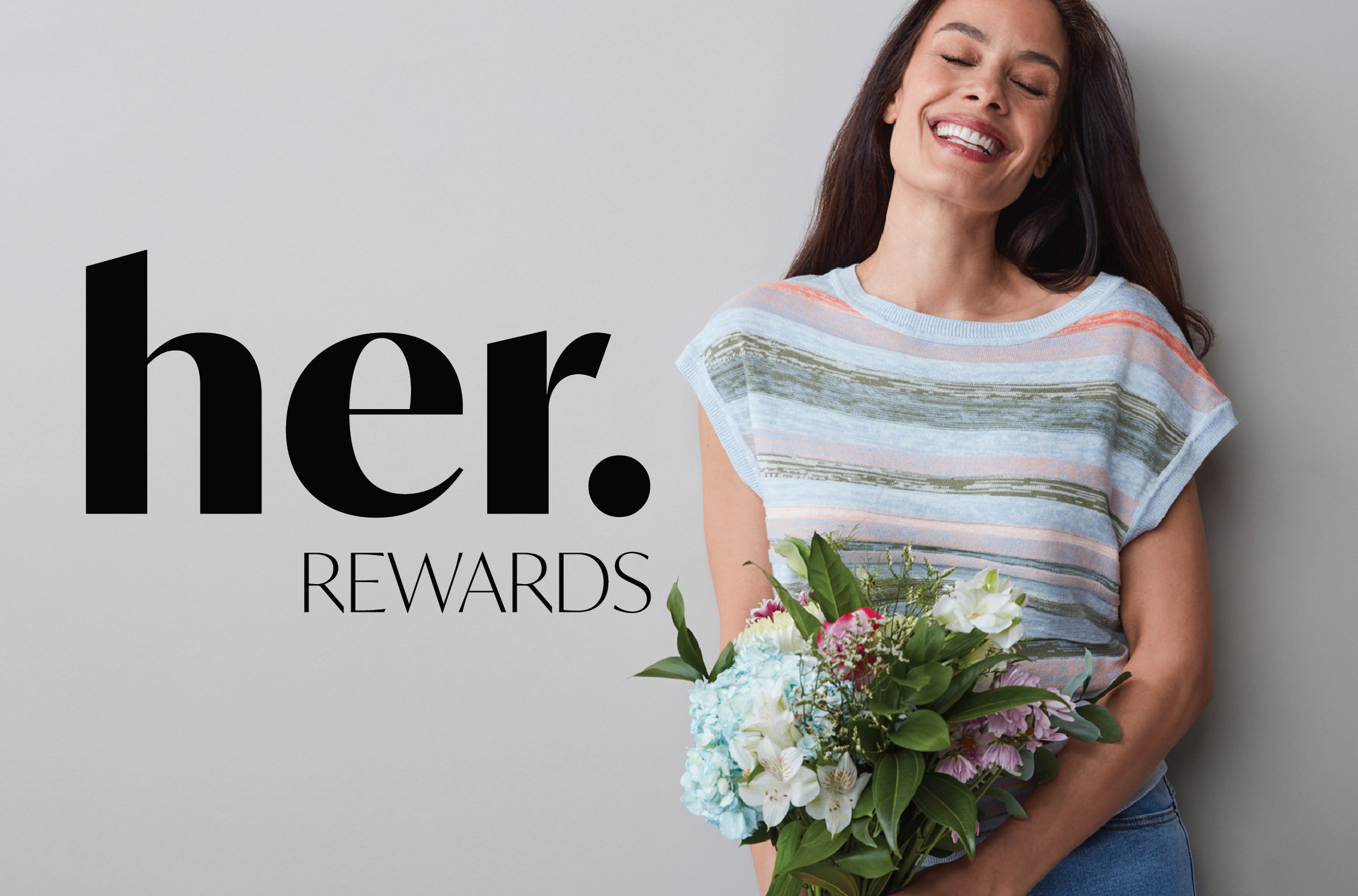 Smiling woman holding flowers with 