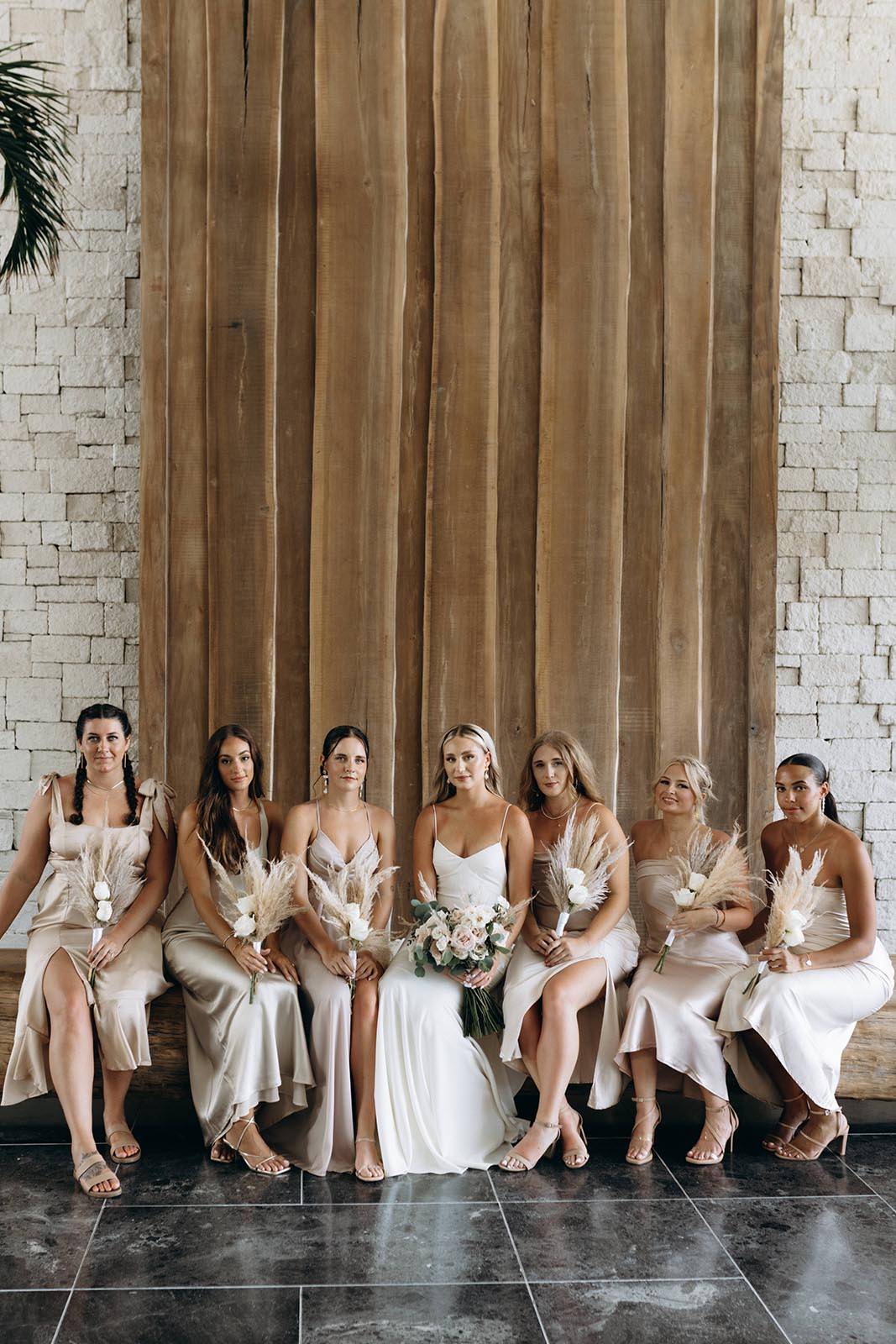 Bride, alongside her bridesmaids