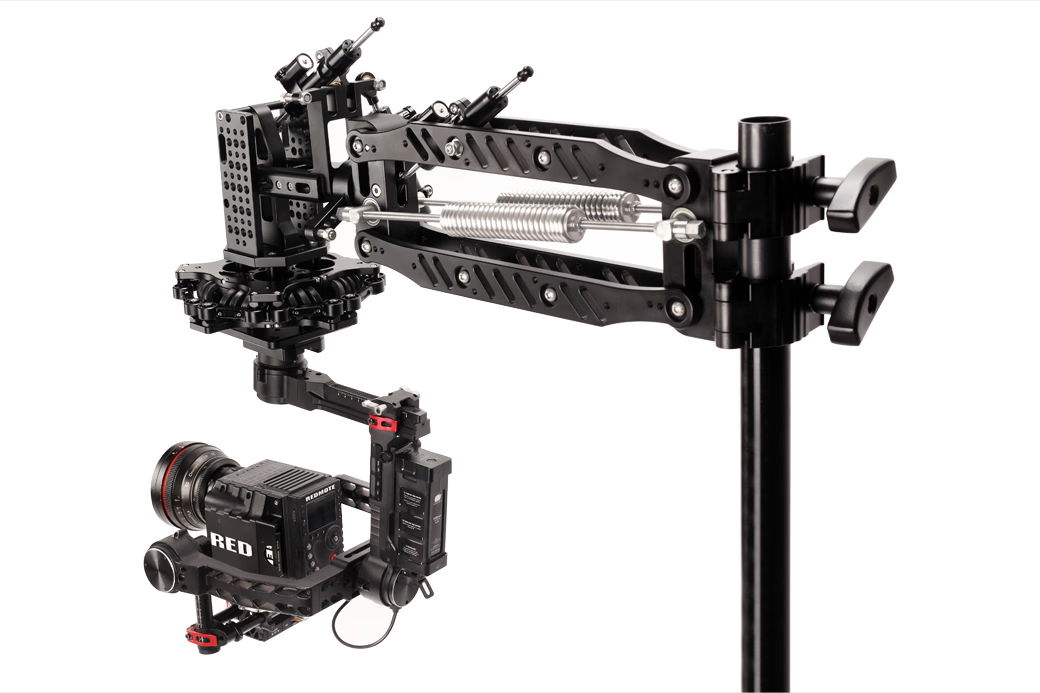 Camera stabilizer mounted on a stand with adjustable arm and gimbal.