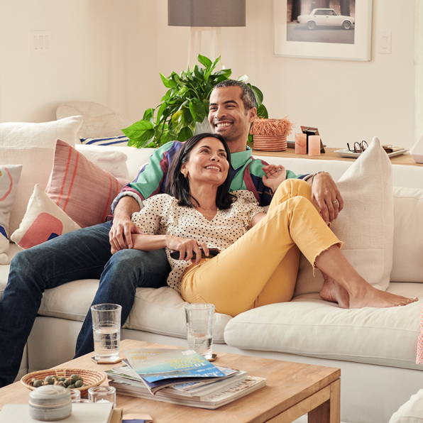 Family enjoying TV set up