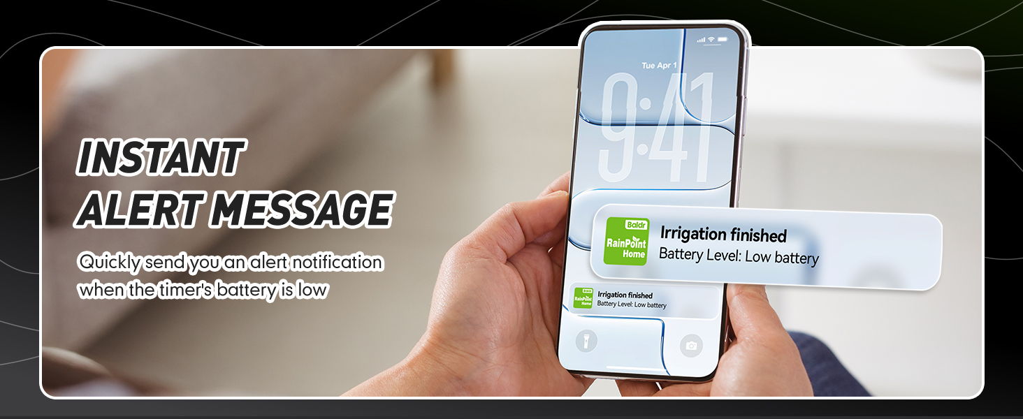 Person holding a smartphone displaying an instant alert message.