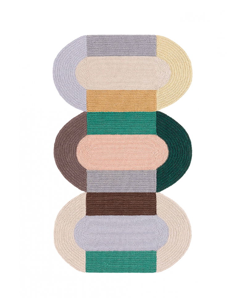 Colorful Trio Crochet Rug by GAN featuring stacked segments in various shades.