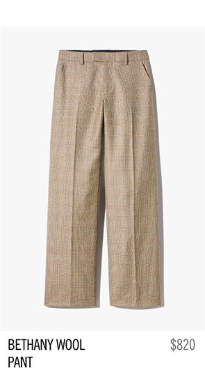 Beige wool pants labeled 