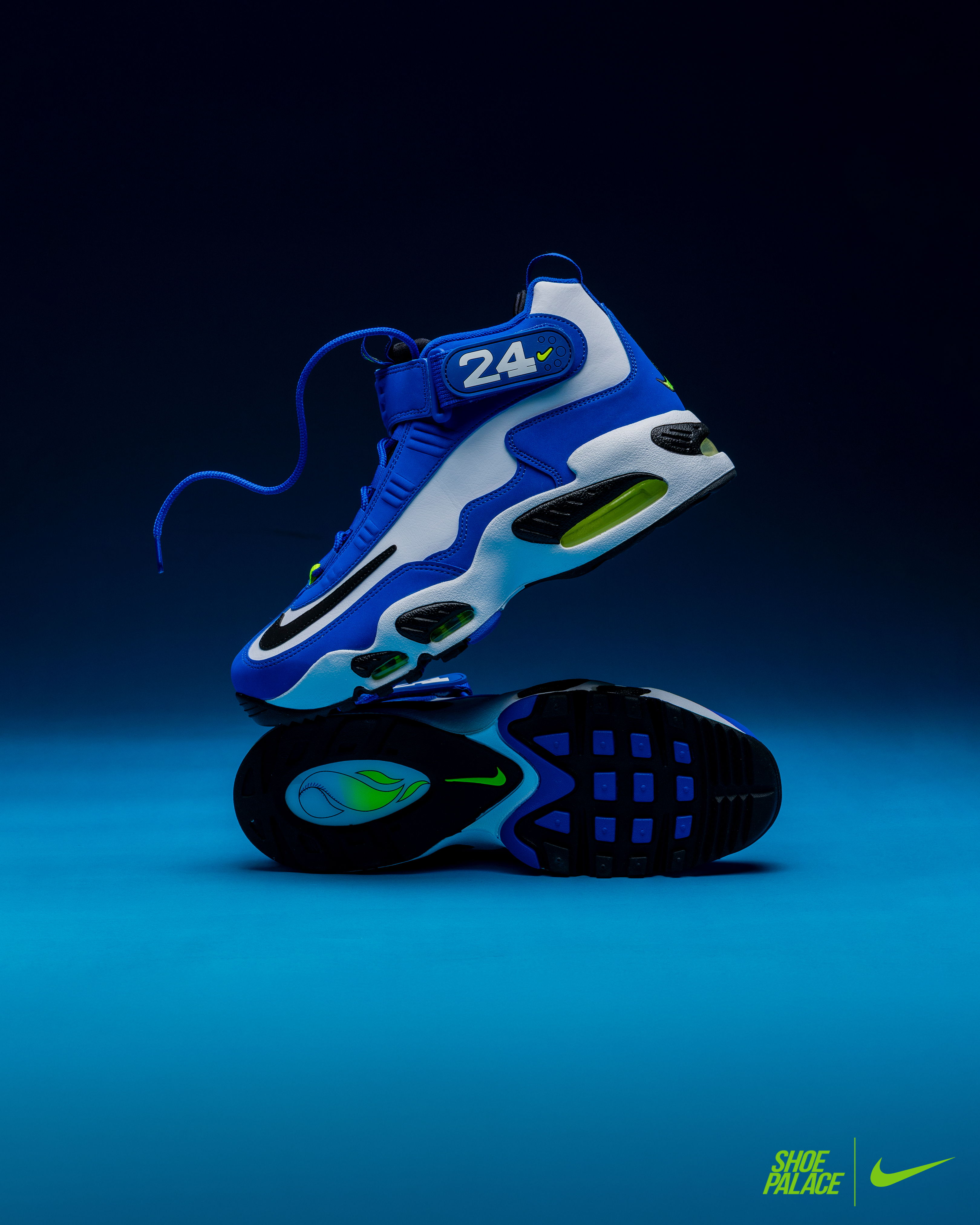 Air Griffey Max 1 Varsity Royal - Blue Nike sneakers displayed against a dark blue background.