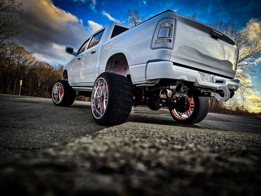 Close-up of Outlaw train horn bells mounted on Dodge RAM 1500 HornBlasters gallery photo 3