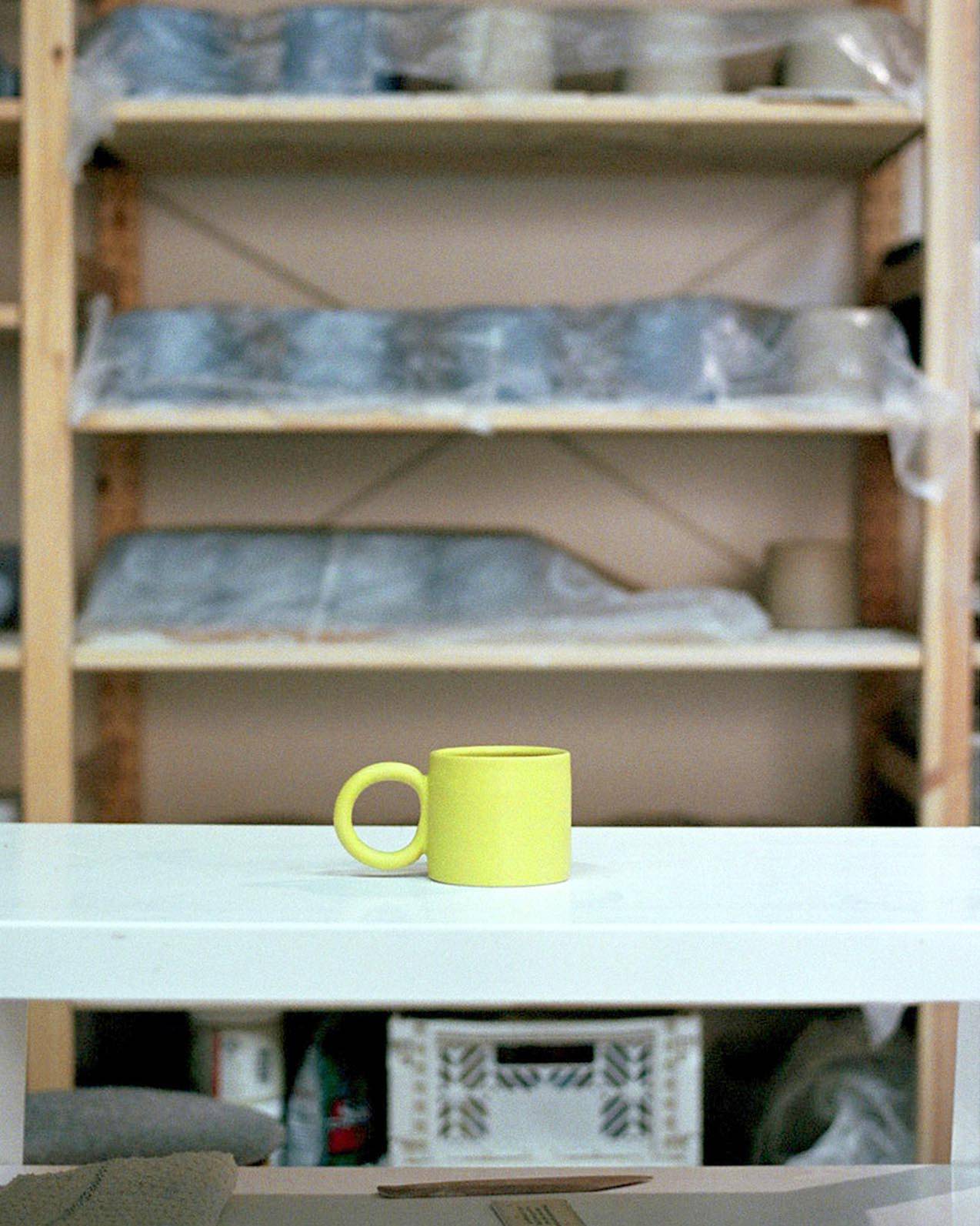 Image of the Circle Mug by Ekua Ceramics in Sara's ceramic studio. 