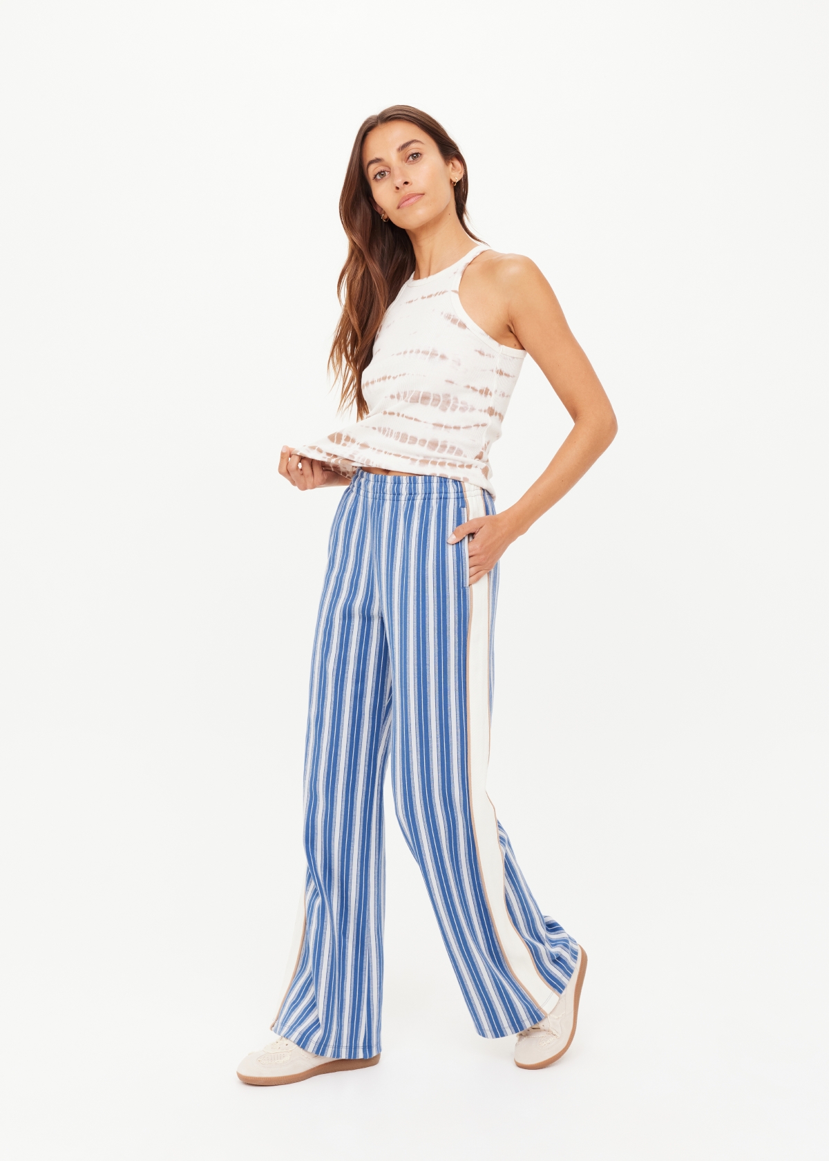 Striped blue wide-leg pants worn by a model.