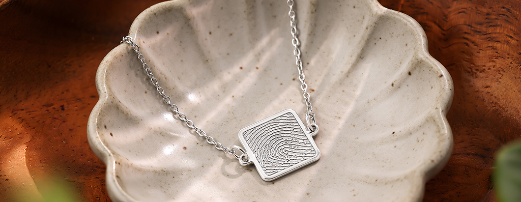 sterling silver square charm bracelet with fingerprint