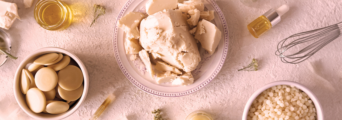 Ingredients and tools for skincare or cooking on a light background.