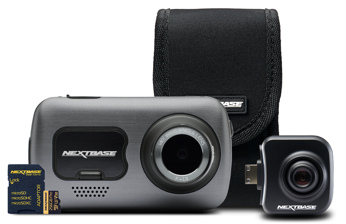 Camera with accessories including a case and memory card.
