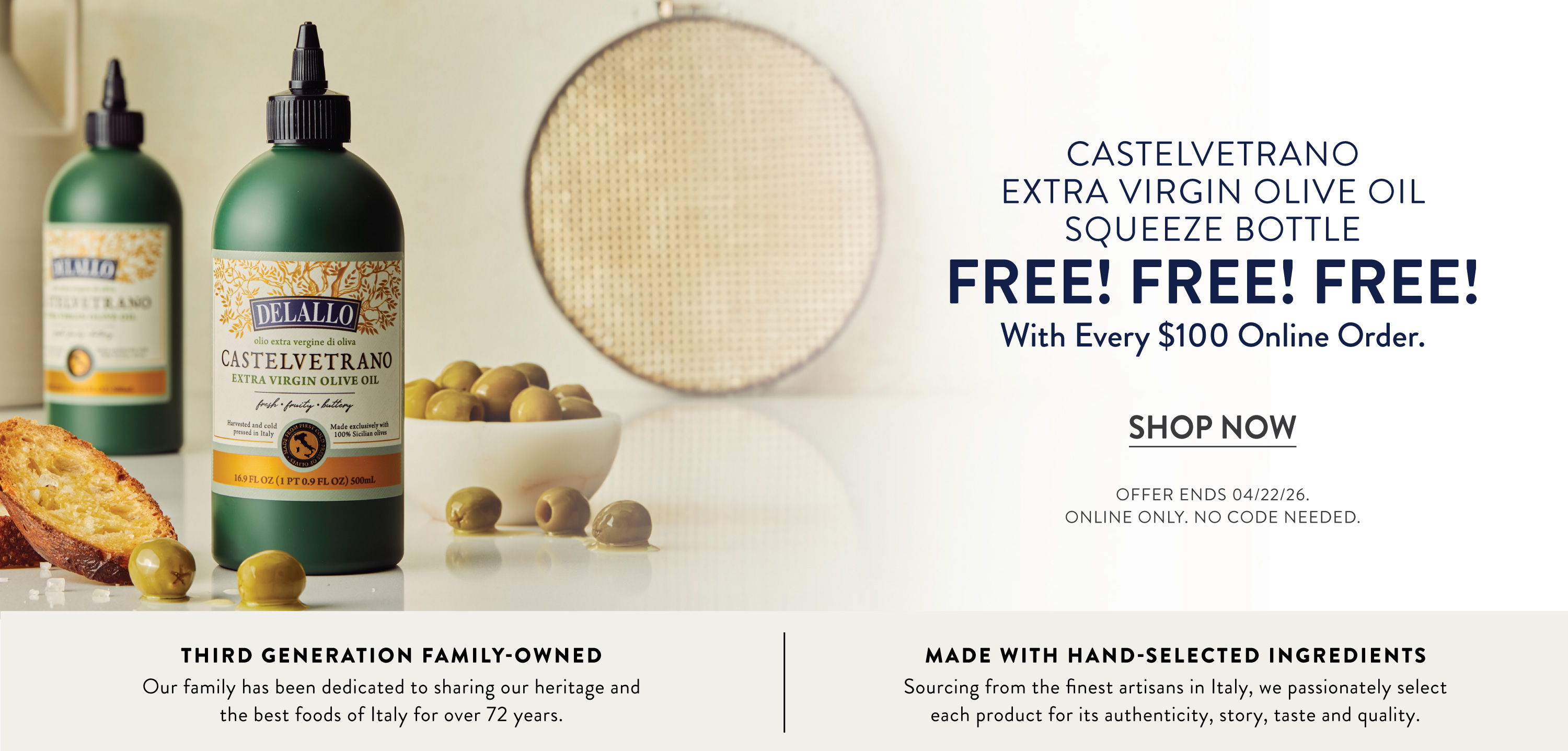 Bottles of olive oil with promotional text and a bowl of olives.