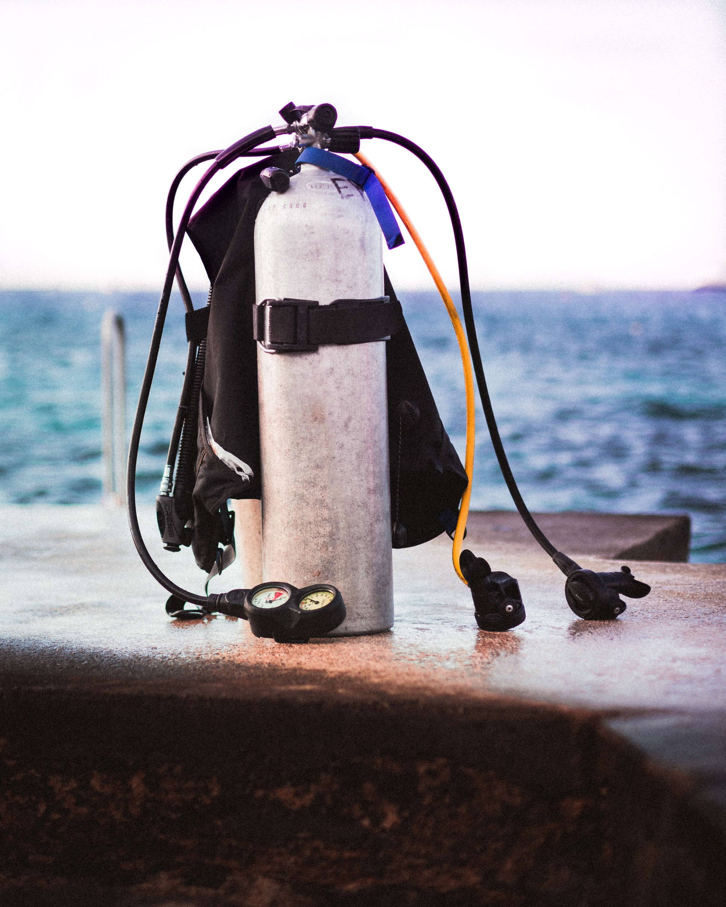 scuba tank standing up filled with oxygen