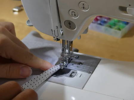 Feed Fabric Into Rolled Hem Foot Evenly