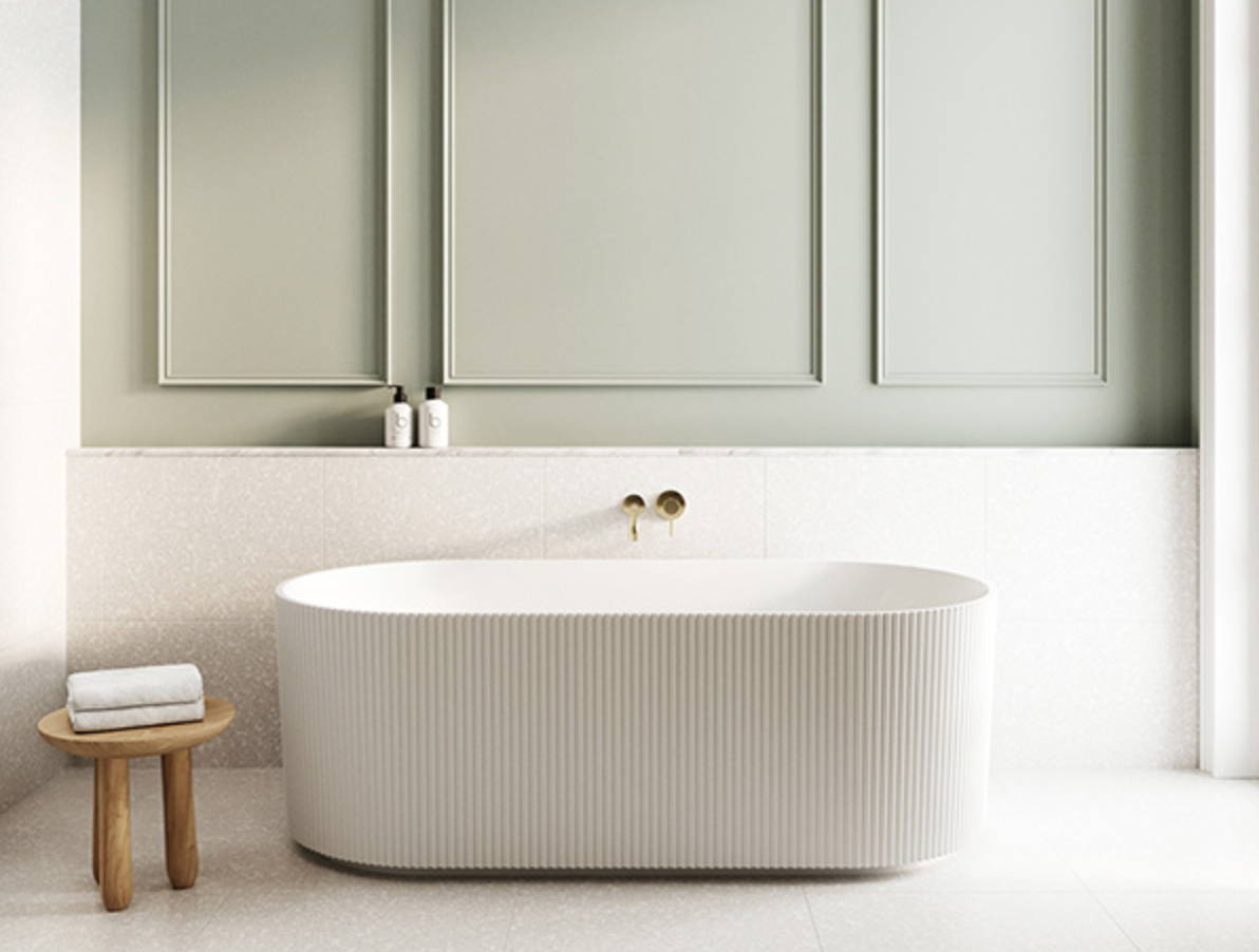 Scandinavian Luxe Bathroom inspiration with feature back to corner fluted bath, vanity and gold tap ware and accessories