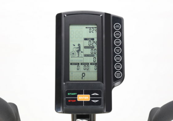 Display panel of an exercise machine with buttons and digital readout.