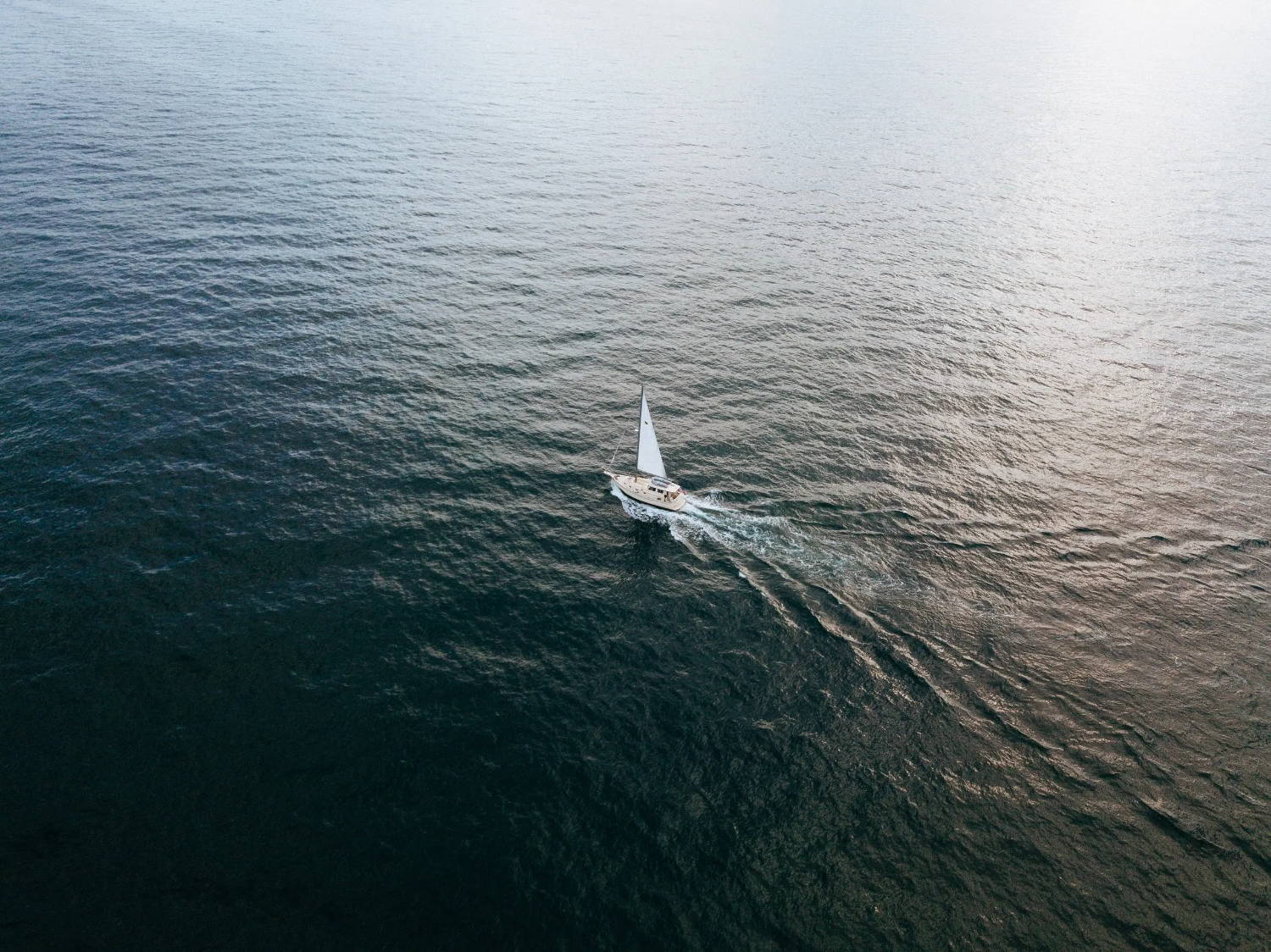 Overhead shot of a sailboat on the ocean