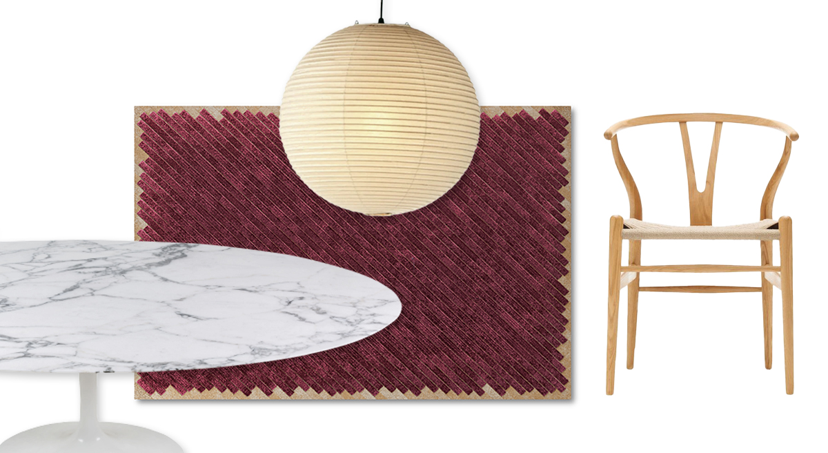Table,Carl Hansen chair, pendant light, and textured rug in a modern setting.
