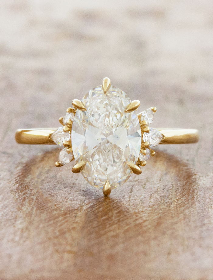 caption:Shown with 2ct oval diamond in 14k yellow gold
