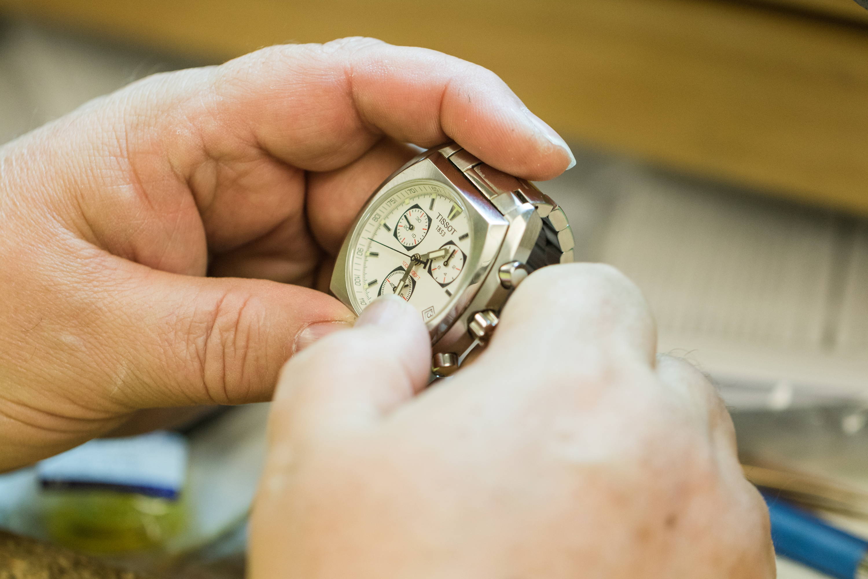Jeweler inspecting a watch